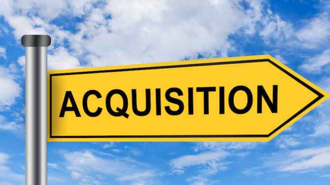 Acquisition Sign Against Blue Sky | Asurio Acquisition By ServiceTrade